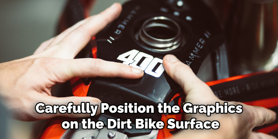 Carefully Position the Graphics on the Dirt Bike Surface