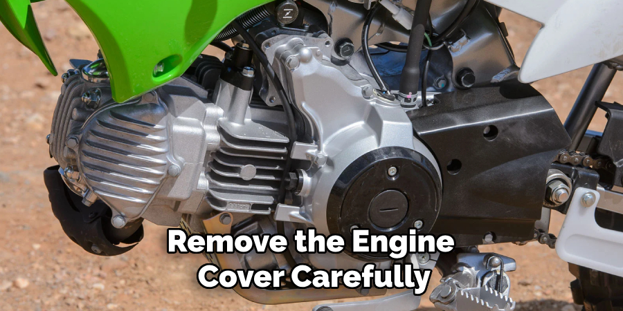 Remove the Engine Cover Carefully